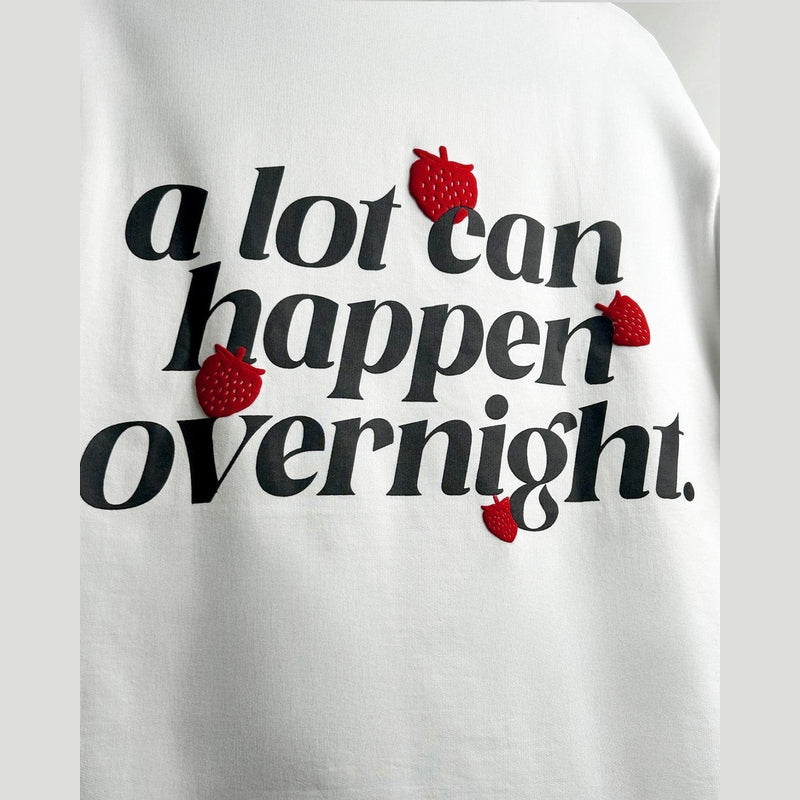 A LOT CAN HAPPEN OVERNIGHT HEAVYWEIGHT T-SHIRT