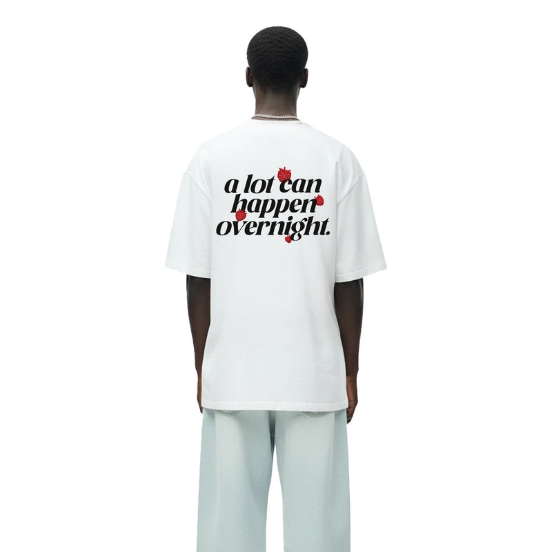 A LOT CAN HAPPEN OVERNIGHT HEAVYWEIGHT T-SHIRT
